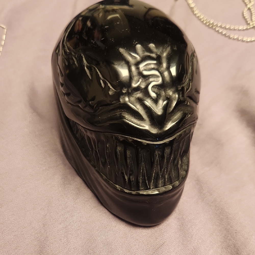 Black Obsidian Venom. Monstrous Head Sculpture with Sharp Teeth
